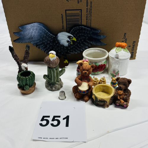 Lot 551: Mixed lot: resin bear/eagle figurines, apple-motif ceramic crock, honey pot, holly glass bud vase, wooden eagle wall decor, thimble