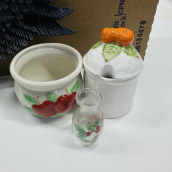 Lot 551: Mixed lot: resin bear/eagle figurines, apple-motif ceramic crock, honey pot, holly glass bud vase, wooden eagle wall decor, thimble