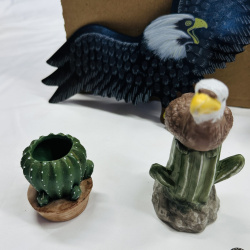 Lot 551: Mixed lot: resin bear/eagle figurines, apple-motif ceramic crock, honey pot, holly glass bud vase, wooden eagle wall decor, thimble