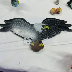 Lot 551: Mixed lot: resin bear/eagle figurines, apple-motif ceramic crock, honey pot, holly glass bud vase, wooden eagle wall decor, thimble