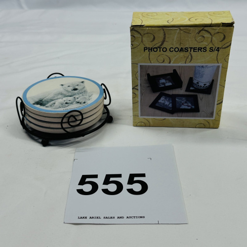 Lot 555: 2006 National Wildlife Federation Polar Bear ceramic photo coasters, set of 4 with wire rack, in box