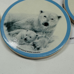 Lot 555: 2006 National Wildlife Federation Polar Bear ceramic photo coasters, set of 4 with wire rack, in box