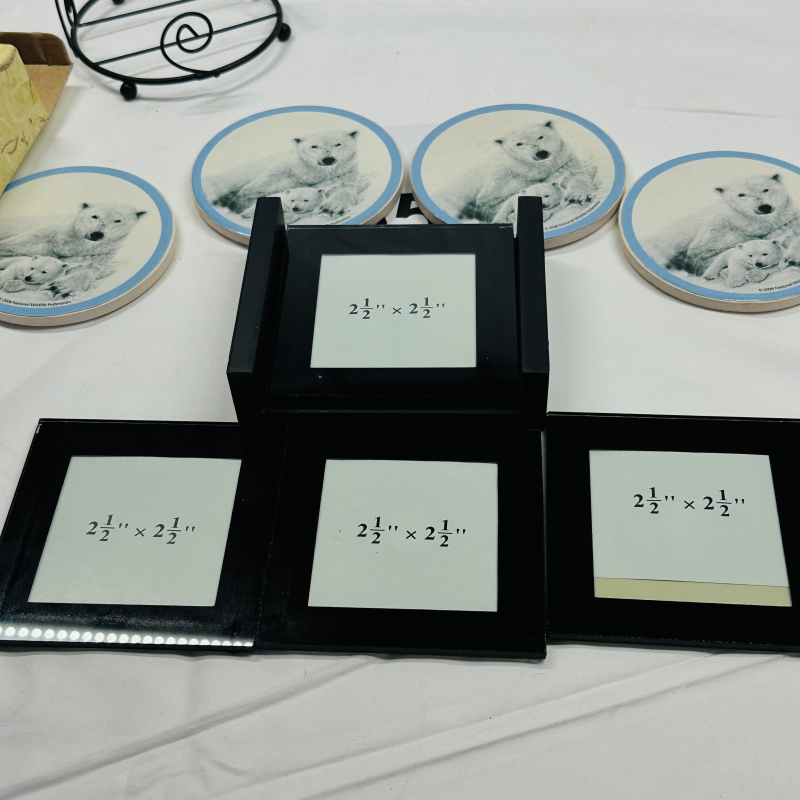 Lot 555: 2006 National Wildlife Federation Polar Bear ceramic photo coasters, set of 4 with wire rack, in box