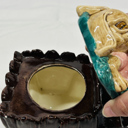 Lot 556: Majolica-style rabbit sleeping in wheelbarrow figural planter/dish, sculpted ceramic