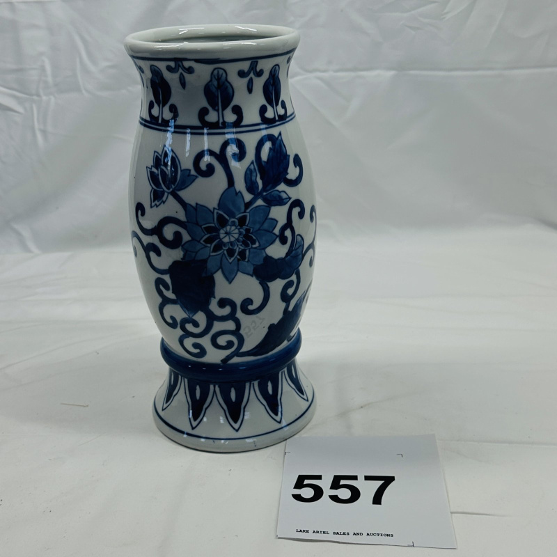 Lot 557: Blue and white porcelain vase, hand-painted lotus flower and scroll design, footed baluster form