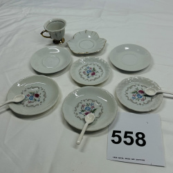 Lot 558: Vintage Japan porcelain floral demitasse cup, saucers & mini plates lot with gold trim, 9 pieces
