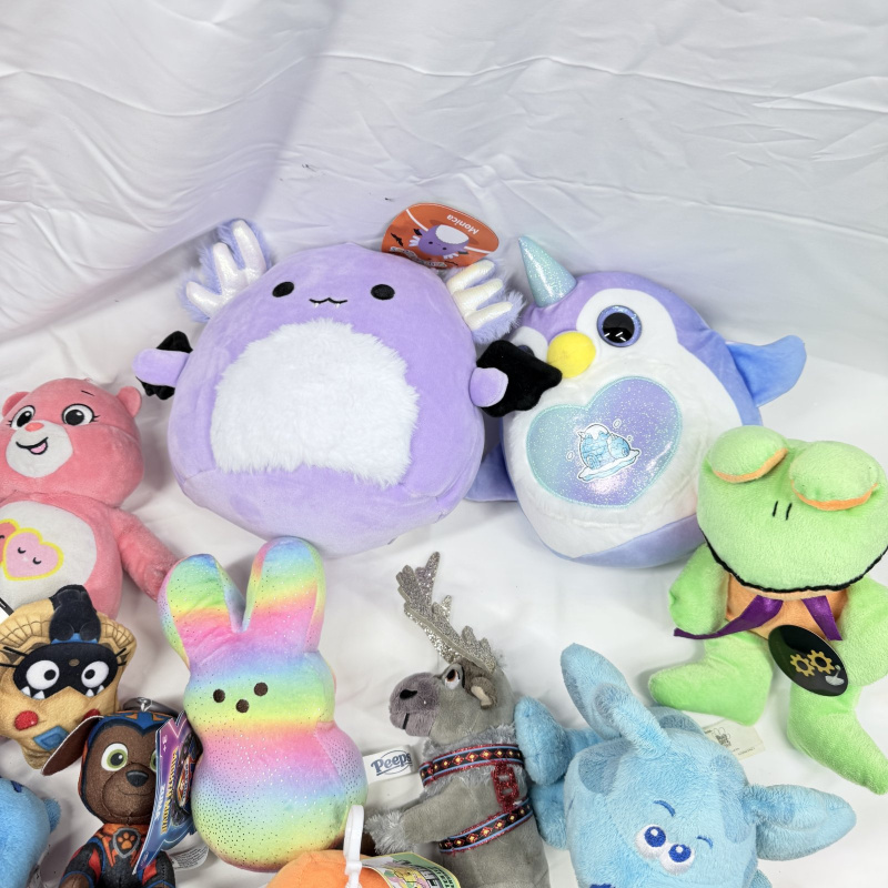 Lot 505: Mixed plush toy lot: Squishmallows, Disney Stitch/Mickey/Olaf, Care Bear, Nightmare Before Christmas, Marvel, DC Batman, Paw Patrol, Peeps & Minecraft figures