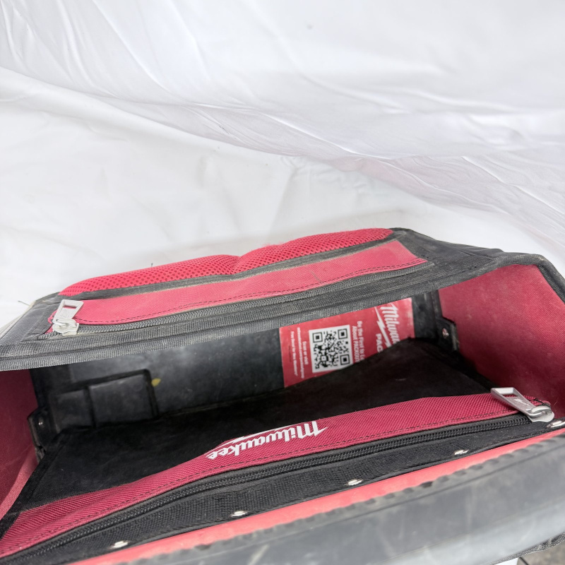 Lot 568: Milwaukee Jobsite Tool Bag with Insulators Local No. 2 embroidered roll pouch, soft-sided open-top tote