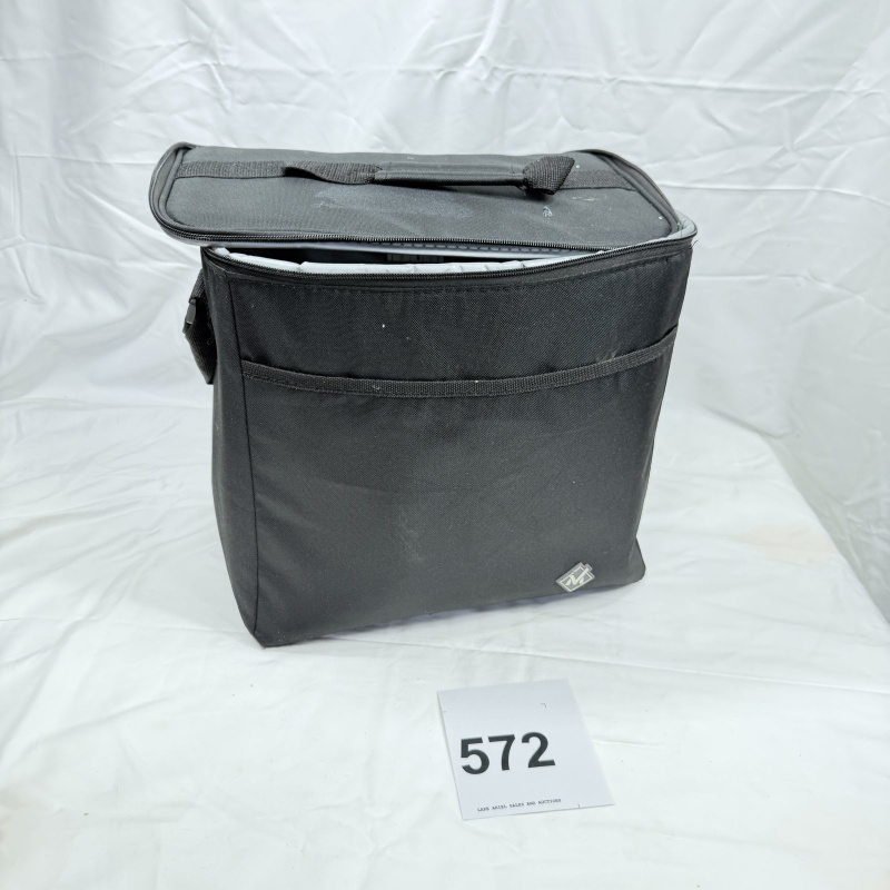 Lot 572: Black insulated soft-sided cooler bag with front pocket, "M" logo emblem