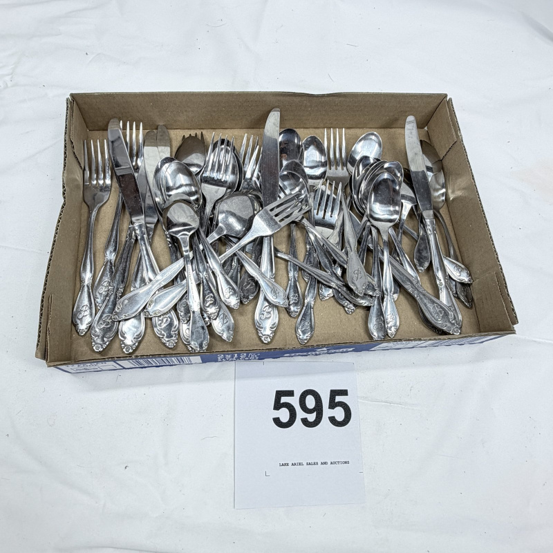 Lot 595: Vintage stainless steel flatware set with monogrammed "B" handles, mixed forks knives and spoons