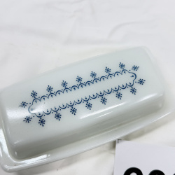 Lot 603: 1970s Pyrex "Snowflake Blue" 1/4 lb covered butter dish, milk glass
