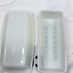 Lot 603: 1970s Pyrex "Snowflake Blue" 1/4 lb covered butter dish, milk glass