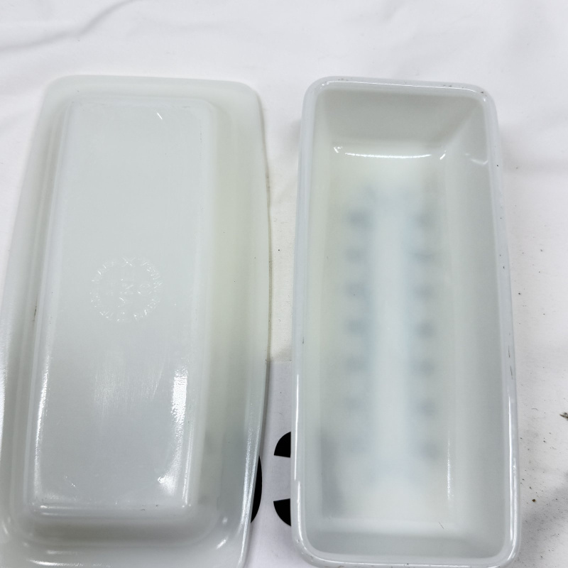 Lot 603: 1970s Pyrex "Snowflake Blue" 1/4 lb covered butter dish, milk glass