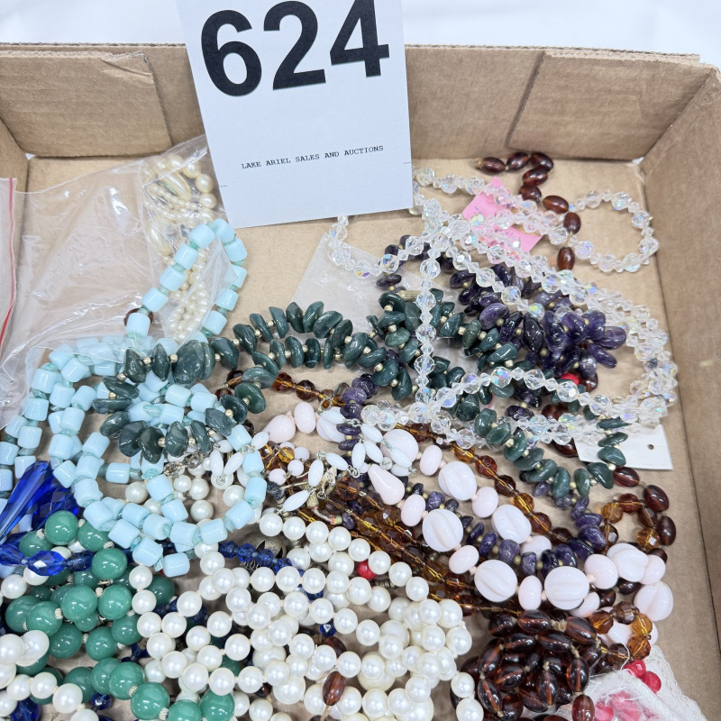 Lot 624: Vintage costume jewelry lot, mixed beaded necklaces including faux pearls, glass, crystal, and carved bead styles