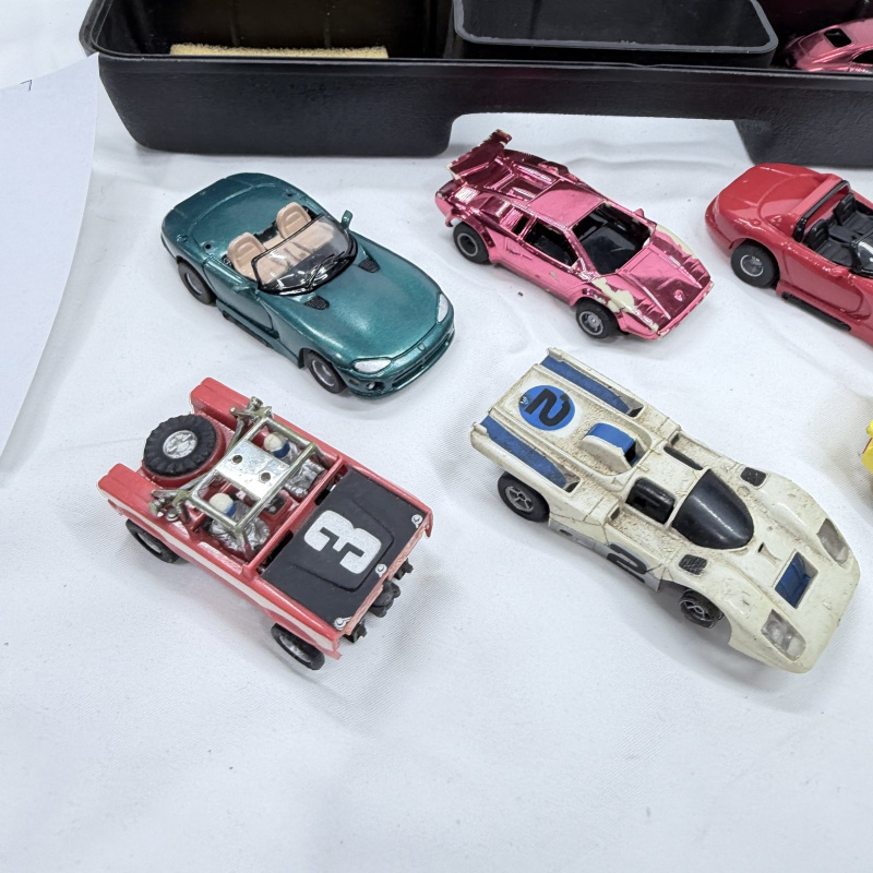 Lot 628: Vintage Aurora AFX/slot car HO scale racing cars group with Aurora Products Corp. carry case, mixed lot