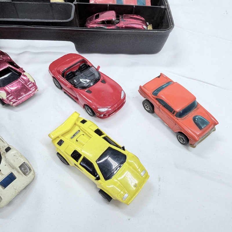Lot 628: Vintage Aurora AFX/slot car HO scale racing cars group with Aurora Products Corp. carry case, mixed lot