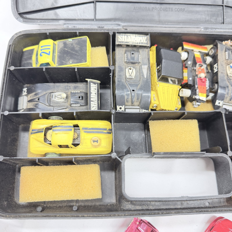 Lot 628: Vintage Aurora AFX/slot car HO scale racing cars group with Aurora Products Corp. carry case, mixed lot