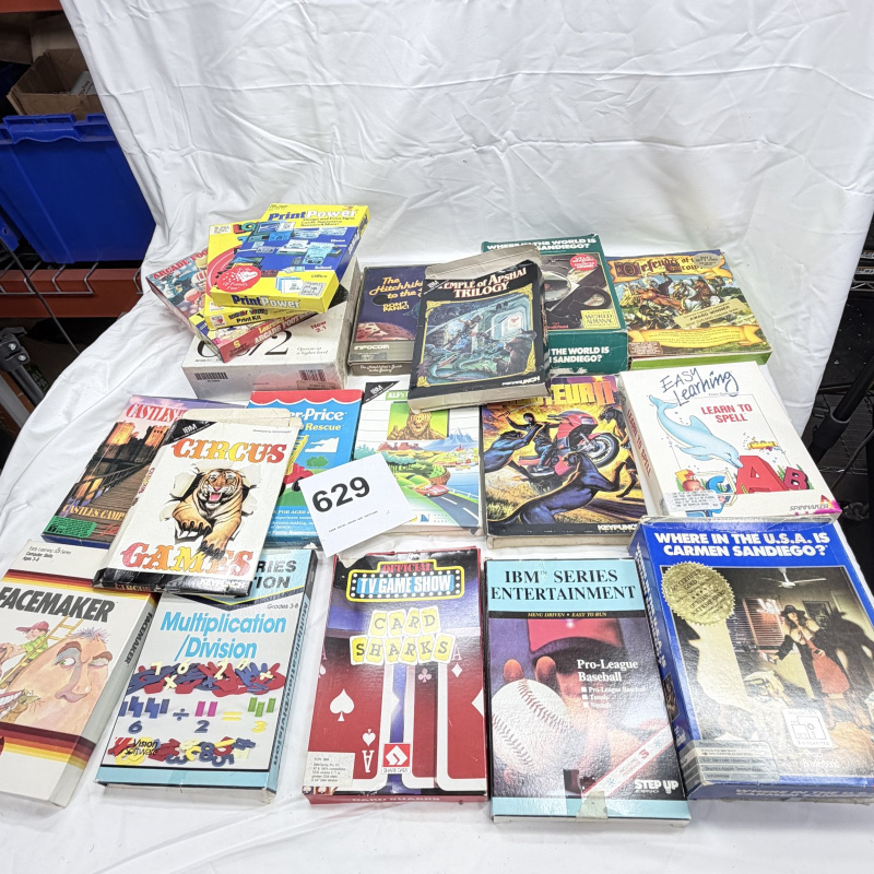 Lot 629: Vintage 1980s IBM/PC big-box software lot: Carmen Sandiego, Defender of the Crown, Temple of Apshai Trilogy, Hitchhiker's Guide, Card Sharks, 20+ titles