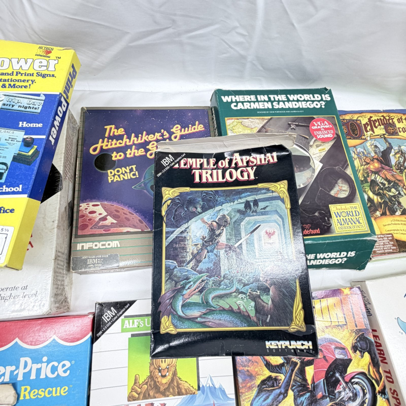 Lot 629: Vintage 1980s IBM/PC big-box software lot: Carmen Sandiego, Defender of the Crown, Temple of Apshai Trilogy, Hitchhiker's Guide, Card Sharks, 20+ titles