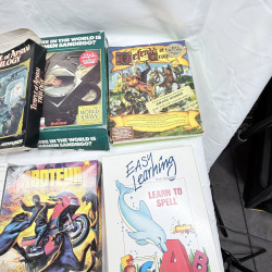 Lot 629: Vintage 1980s IBM/PC big-box software lot: Carmen Sandiego, Defender of the Crown, Temple of Apshai Trilogy, Hitchhiker's Guide, Card Sharks, 20+ titles