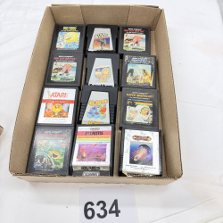 Lot 634: 1980s Atari 2600 game cartridge lot (12): Pac-Man, Ms. Pac-Man, Q*bert, Defender, Star Wars, Atlantis, Super Breakout, Tutankham, Journey Escape