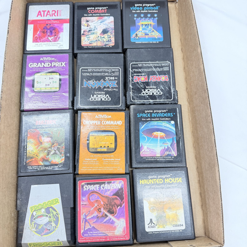 Lot 635: Vintage Atari 2600 & ColecoVision game cartridge lot (12): Combat, Space Invaders, Frogger, Donkey Kong, Zaxxon, Berzerk, Haunted House