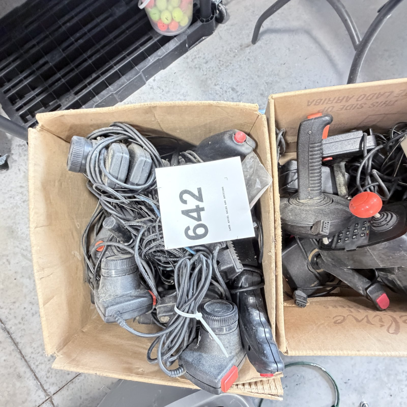 Lot 642: Vintage Atari 2600/CX2600 & ColecoVision console lot with Sears Tele-Games, controllers, joysticks and Coleco Roller Controller
