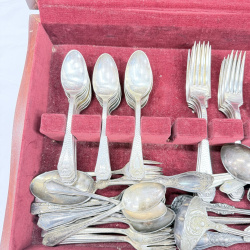Lot 643: Vintage silverplate flatware canteen, mixed patterns, in fitted wooden chest with velvet lining, service for 12 plus extra serving pieces