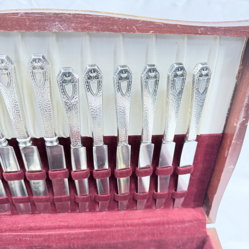 Lot 643: Vintage silverplate flatware canteen, mixed patterns, in fitted wooden chest with velvet lining, service for 12 plus extra serving pieces