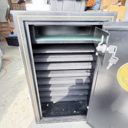Lot 659: "World Monetary Exchange Reserve" Safe With Keys and Code