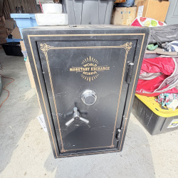 Lot 659: "World Monetary Exchange Reserve" Safe With Keys and Code
