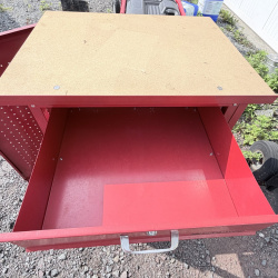 Lot 660: Test Rite rolling tool cabinet with locking drawer, pegboard door, and particle board top on casters