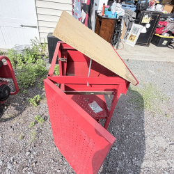 Lot 660: Test Rite rolling tool cabinet with locking drawer, pegboard door, and particle board top on casters