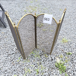 Lot 563: Vintage brass 4-panel folding fireplace screen with mesh spark guard, arched panels